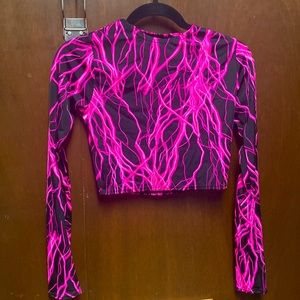 Pink lightning long sleeve crop top.